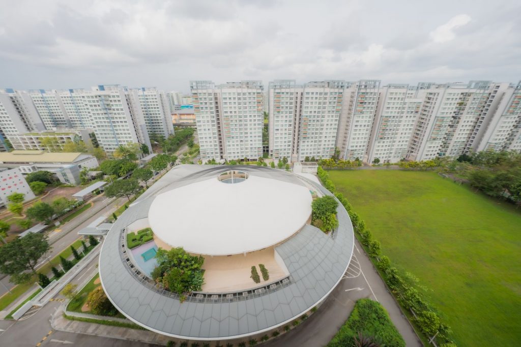 This unconventionally designed preschool looks pretty much like a UFO from above.